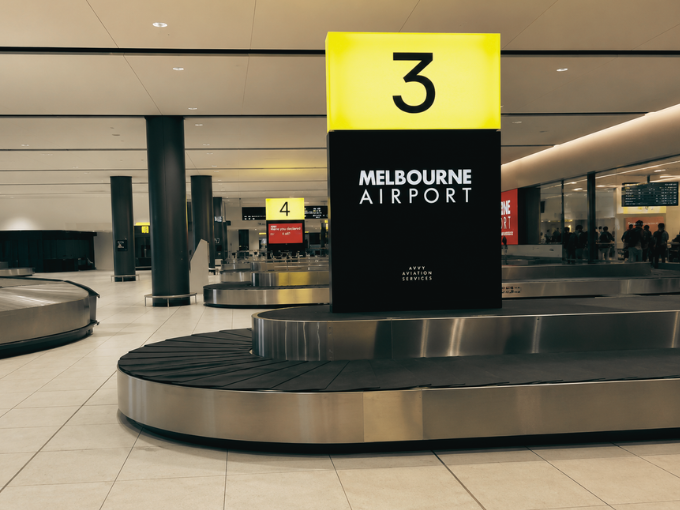 Melbourne Airport Terminal 3 arrivals hall — chauffeur meeting point at baggage carousel